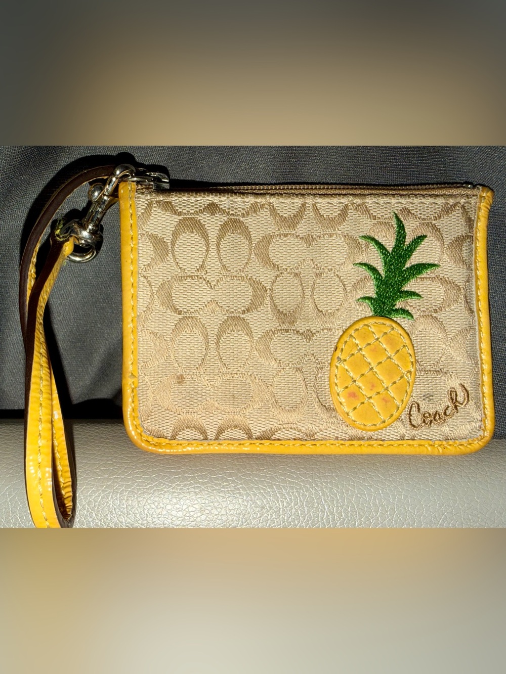 Coach 2019 collection Limited Edition Tan Wristlet with Yellow Pineapple Design